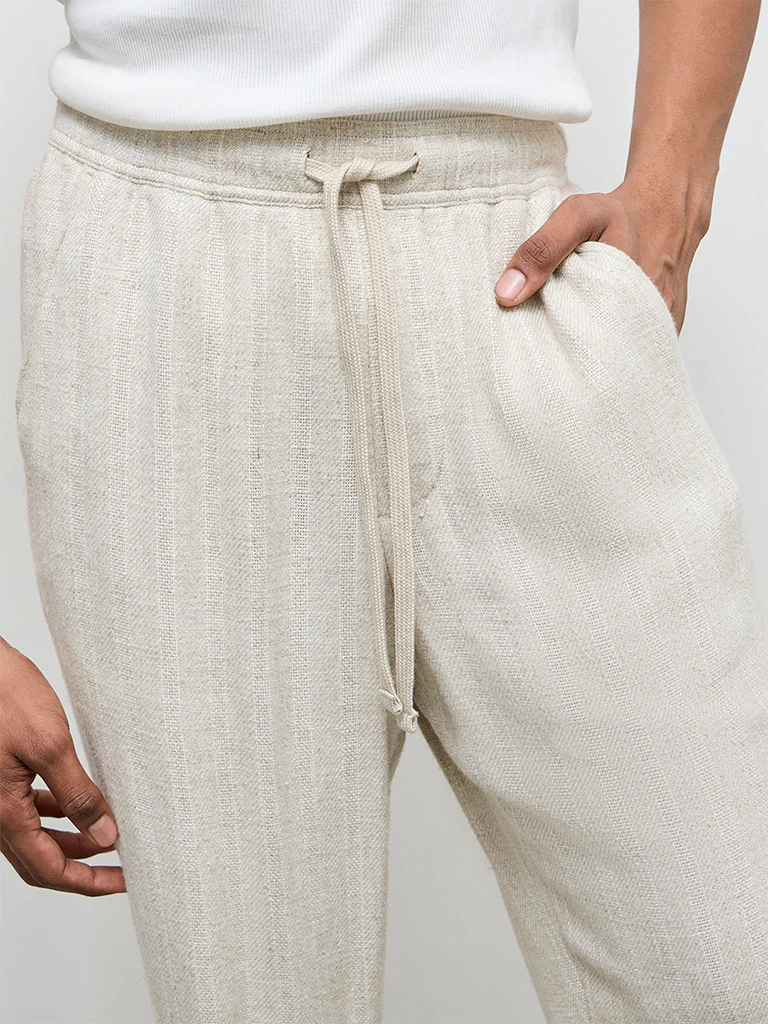 ETA Off-White Textured Relaxed-Fit Mid-Rise Chinos - Image 3