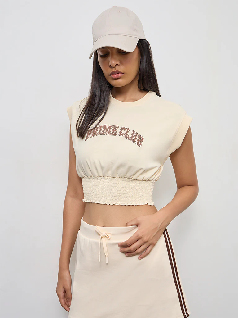 Nuoflexx Cream Text Printed Cotton-Blend Smocked Top