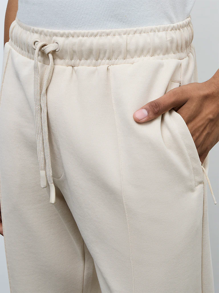 Nuoflexx Off-White Relaxed-Fit Mid-Rise Cotton-Blend Track Pants - Image 4
