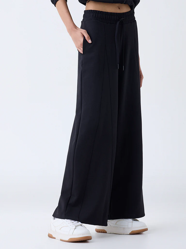 Studiofit Black Solid High-Rise Flared Pants - Image 2