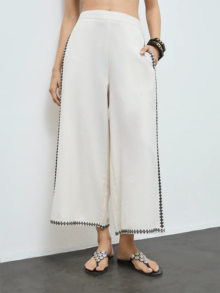 Utsa Off-White Embroidered Cotton-Blend Pants