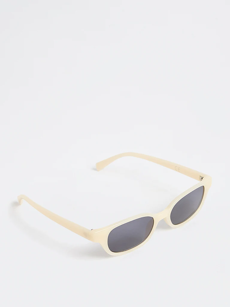 Westside Accessories Off-White Slim Oval Sunglasses with Pouch - Image 2